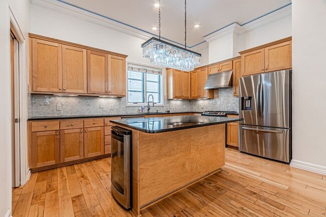Photo - Coming Soon! | 2 Bedroom + Office Townhouse | Private Rooftop Deck | Prime Uptown Location