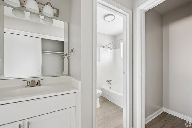 Elevate your living at The Preserve On Conley Apartments. This modern bathroom features sleek finishes and ample space for comfort and convenience. Unwind in a stylish environment tailored for your lifestyle. Schedule your tour today!