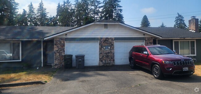 Front picture of the building - 523 159th St E Rental