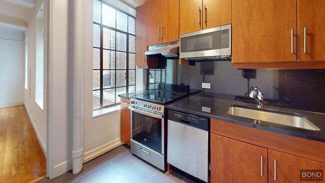 Building Photo - 1 Christopher St Unit 3J Rental