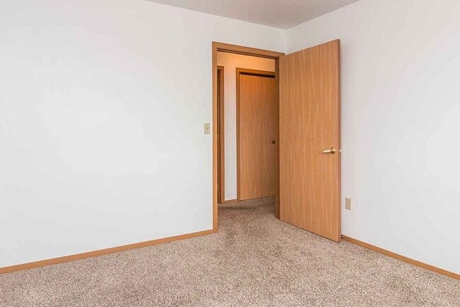 EAST WOODS APARTMENTS