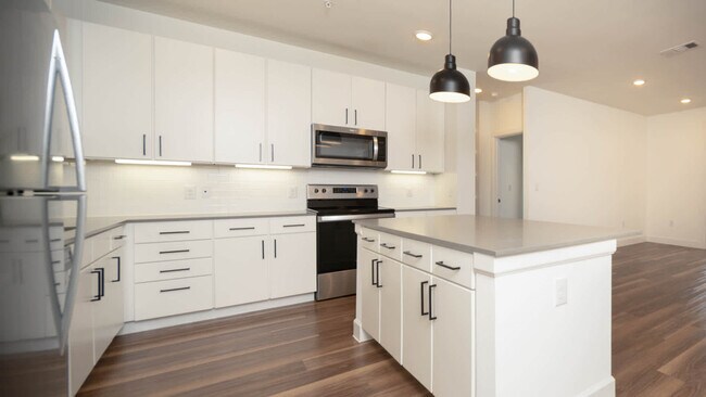 Cocina con electrodomésticos de acero inoxidable - The Weaver