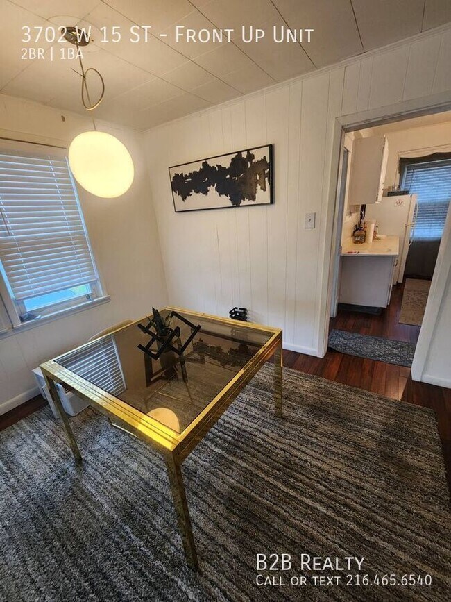 Photo - 3702 W 15th St Unidad Front Up