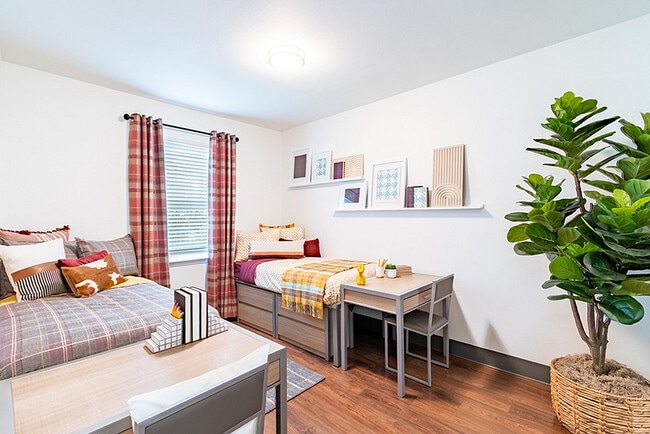 Enjoy this cozy and stylish bedroom designed for relaxation and comfort.
