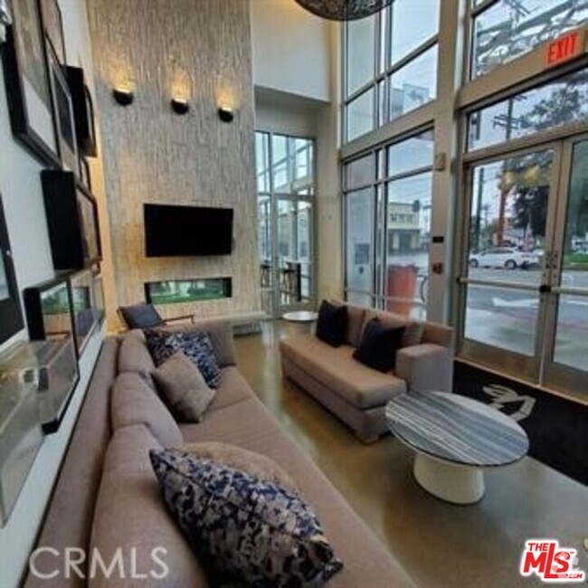 Building Photo - 11405 Chandler Blvd Unit 405 Rental