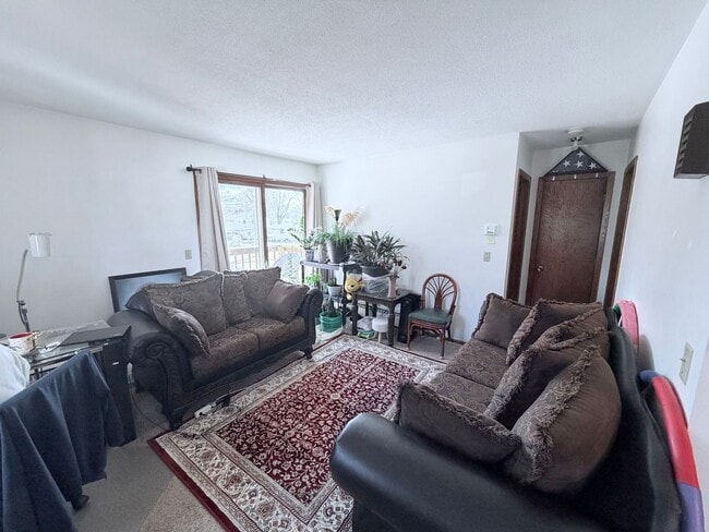 Photo - Stylish Townhome-Style 1BR with Patio, Garage & In-Unit Laundry!