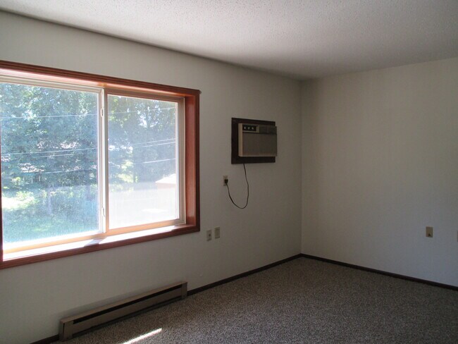 Sala de estar de los apartamentos Larson - Larson Apartments