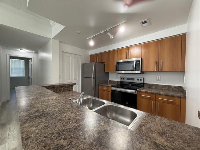 Building Photo - 5800 W Sample Rd Unit 208 Rental