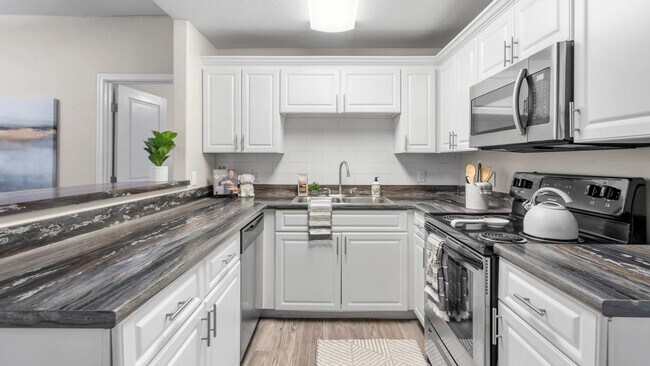 Unleash easy, stylish living with gleaming stainless-steel appliances.