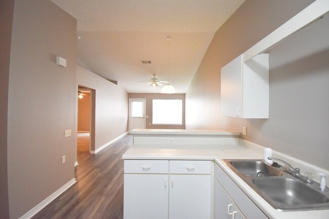 Photo - 2BR Patio Home with Open Layout, LVP Flooring, Private Fenced Yard, HOA Lawn Care & Convenient Bl...