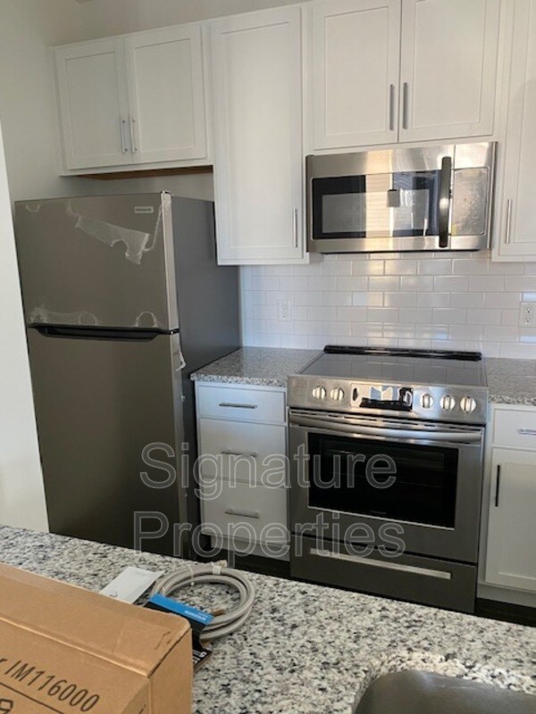 Photo - 110 W 12th St E Unidad A