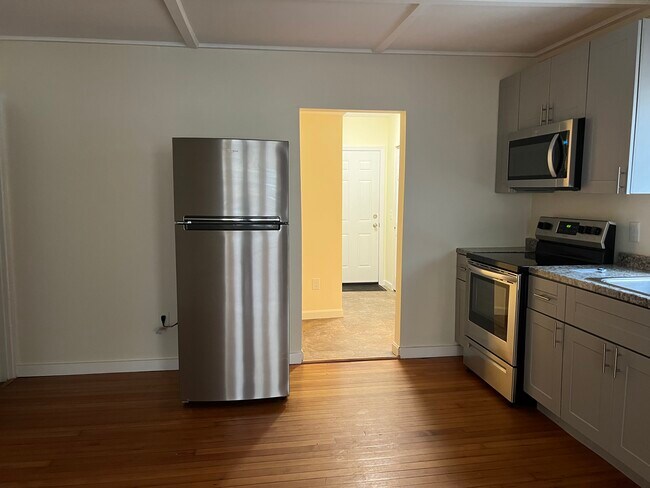 Kitchen to laundry - 682 Tyler St Unit 682A