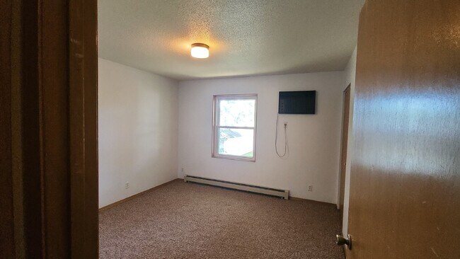 Photo - 2 Bedrooms, 1.5 Bathrooms with Attached Garage, Available Now! Unit 4