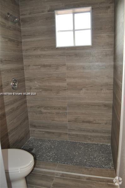 Building Photo - 8306 Santa Monica Ave Rental