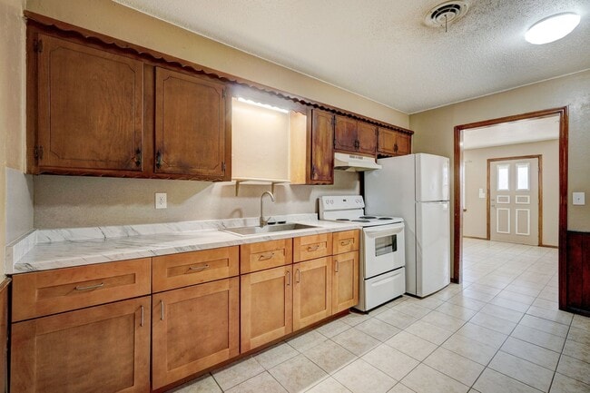 Photo - Charming 2-Bedroom Home with Fenced Backyard in the Heart of Choctaw! Ask About Our $250 Off Move...