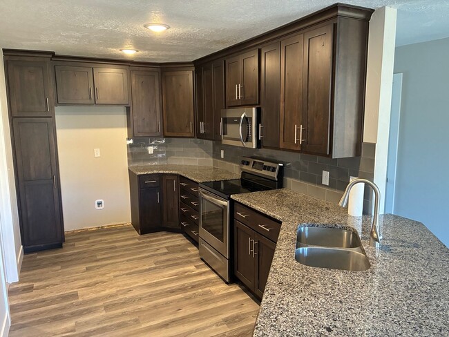 Photo - Beautiful 3 bedroom, 2 bath, 2 car garage duplex in Ozark! Spacious, granite with open / split be...