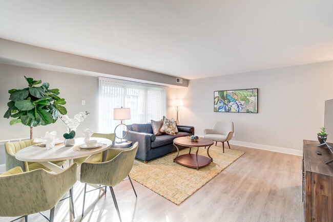 Newly Renovated Living/Dining Areas With Wood-Style Flooring - Creekside Village I