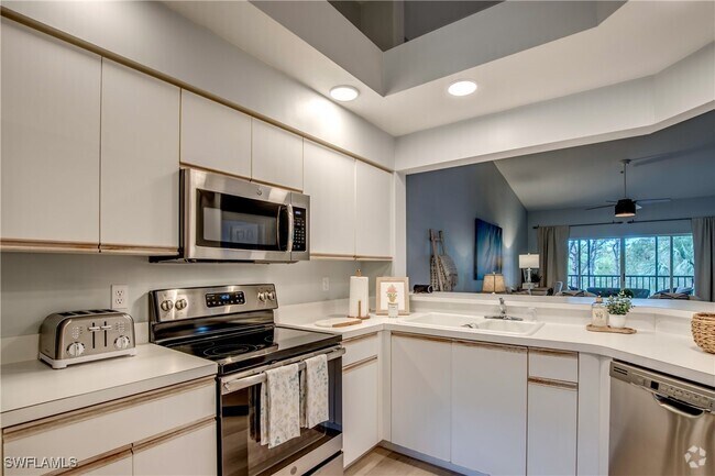 Building Photo - 4161 Sawgrass Point Dr Unit 204 Rental