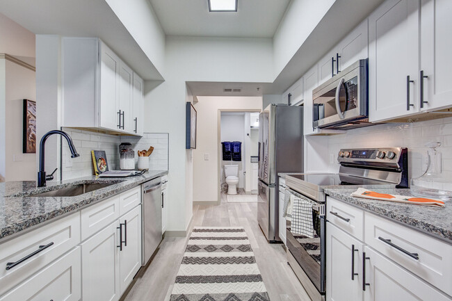 Upgraded Kitchens with Stainless Appliances - Cortland Westminster Apartments