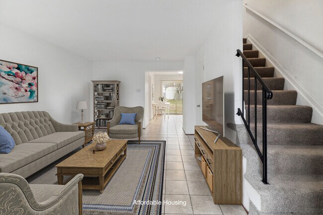 Virtually staged living room - Overlook Manor Townhomes