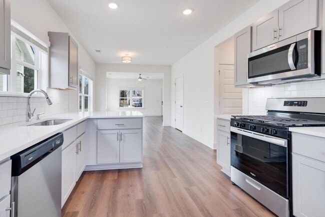 Photo - Primary Suite on main level plus Bonus Lof...
