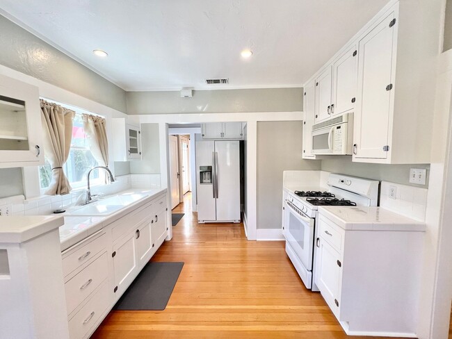 Photo - Charming 2BD/1BA with Hardwood Floors & Spacious Backyard Near Colorado Lagoon