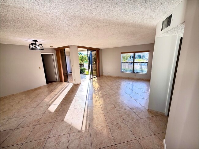 Building Photo - 8657 Boca Glades Blvd W Unit C