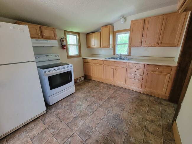 Photo - 321 13th Ave W Unit House