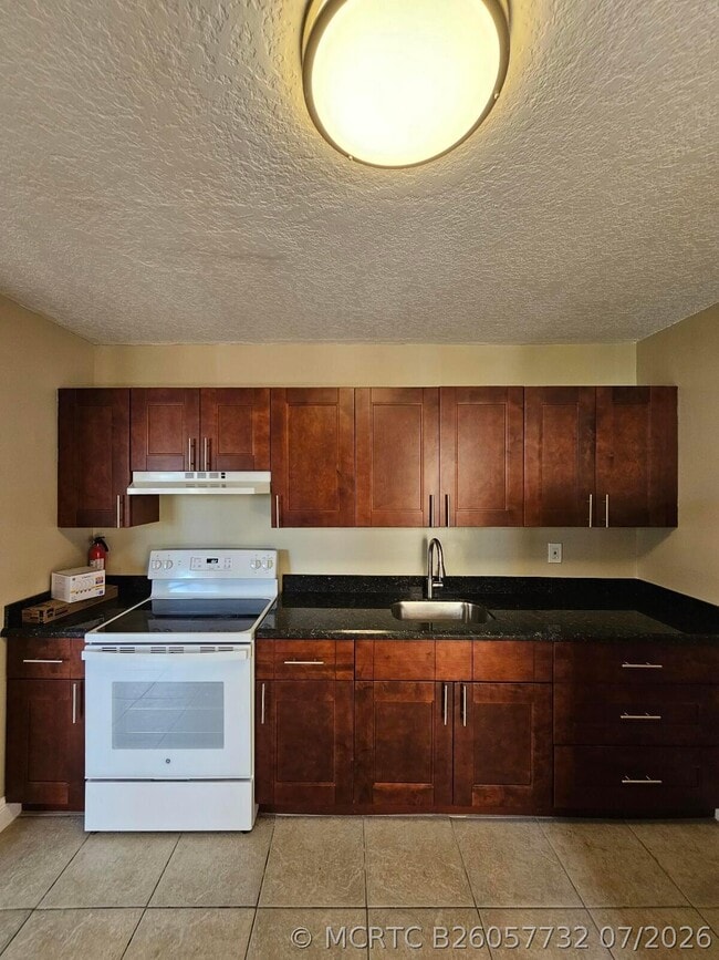 Building Photo - 1200 Blue Heron Blvd Unit 5