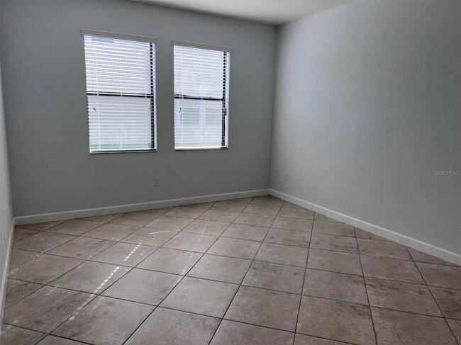 Photo - "Spacious 5-Bed Retreat with Elegant Hardwood & Granite Finishes in Tampa – 3 Full Baths & 3264 S...