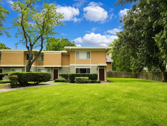 Building Photo - Step into a beautifully refreshed 3-bedroom, 1.5-bath condo that blends comfort, style, and unbea...