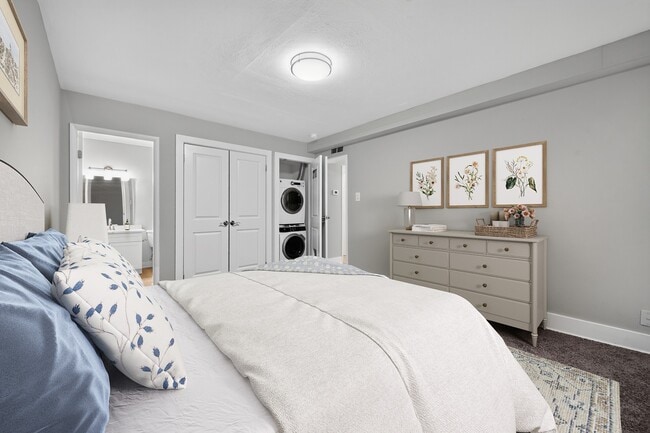 Unwind in a serene bedroom at The Woods at Ambler, an Eagle Rock Community. Enjoy modern amenities and a cozy atmosphere designed for comfort. Schedule your tour today and step into your new sanctuary!