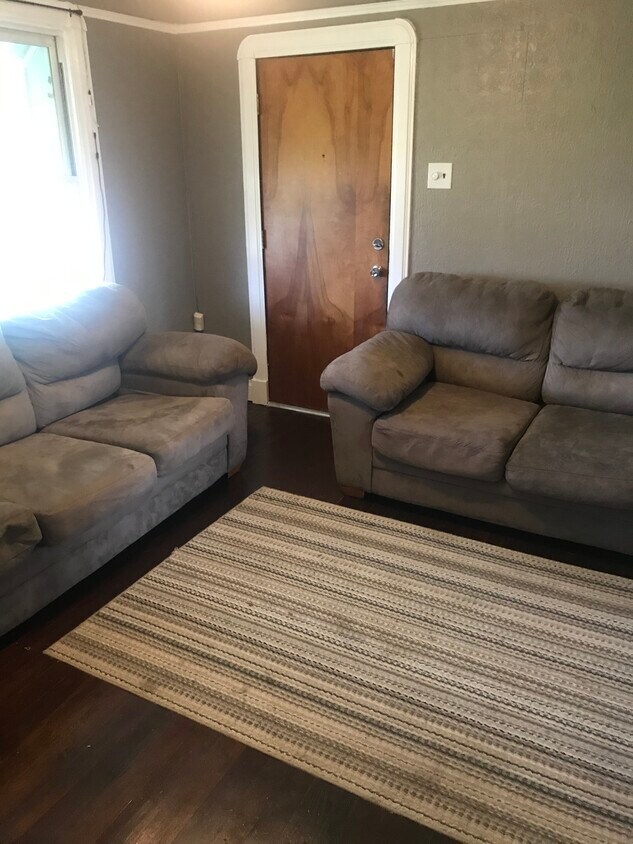 Living room pictured from hallway - 704 Avenue G (Marrero, LA)