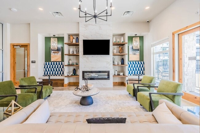 Welcome to Southgate Apartments, where modern design meets comfort. Our stylish lounge features cozy seating, a contemporary fireplace, and vibrant decor, perfect for relaxing or entertaining. Tour today and see your new home!