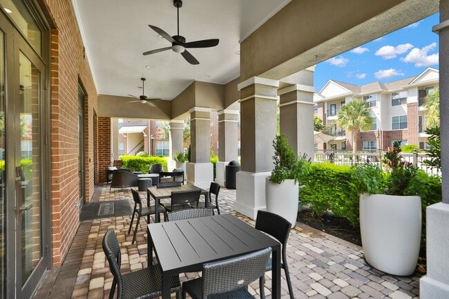 Outdoor Patio Area at Madison on the Meadow Apartments in Stafford, TX 77477