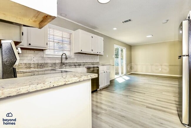 Photo - Beautifully Renovated 4 bedroom / 3 full bath with 1,691 sq feet of space!