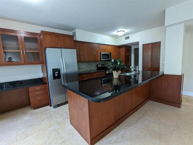 Building Photo - 6966 W Sample Rd Unit 6966