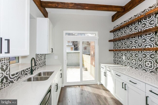 Photo - Gorgeously renovated classic row home with Off-Street Parking