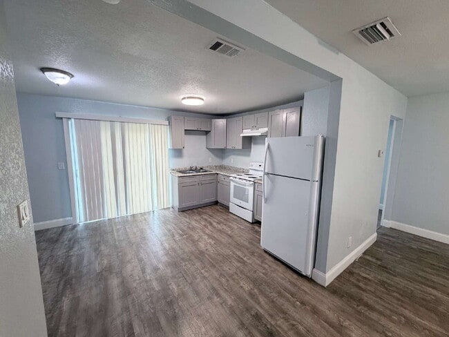 Photo - Charming home features 3 spacious bedrooms and 2 updated bathrooms