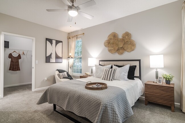 Newly Renovated Primary Bedroom - The Residences on McGinnis Ferry Apartments