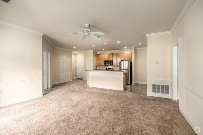 1BR, 1.5BA - 1056SF - Living Room - The Helm and Deemers Landing