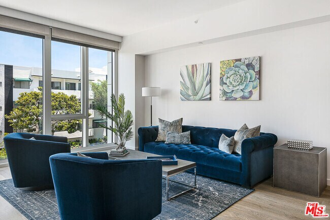 Building Photo - 9000 W 3rd St Unit 204 Rental