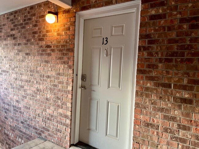 Front door. - 305 Green Briar St Unit 13
