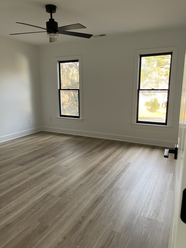 1 of the bedroom. Other bedroom looks the same - 5 Oakwind Ct