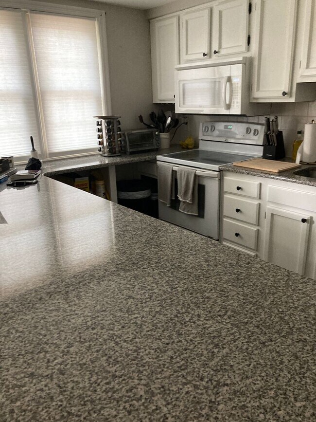 Photo - Fully renovated 2 bedroom townhome on a corner property