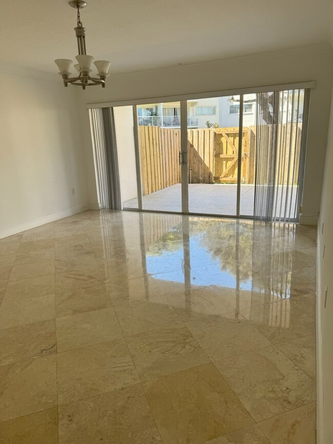 Livingroom and patio - 7803 SW 88th St Unit F-114