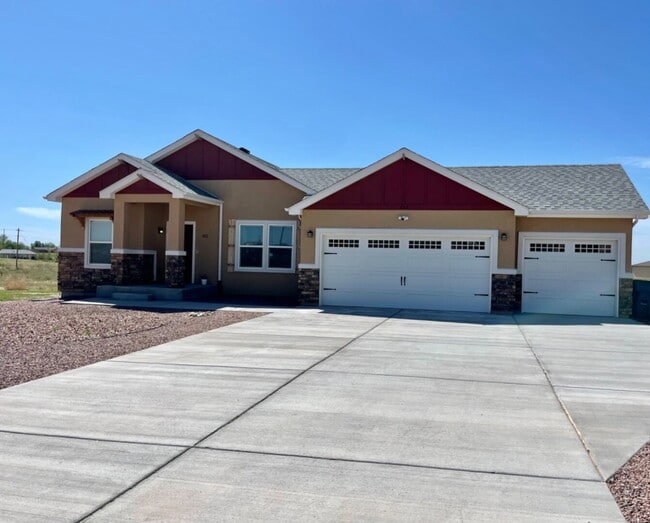 Photo - Stunning 3-Bed Ranch with 3-Car Garage & RV Parking in Pueblo West