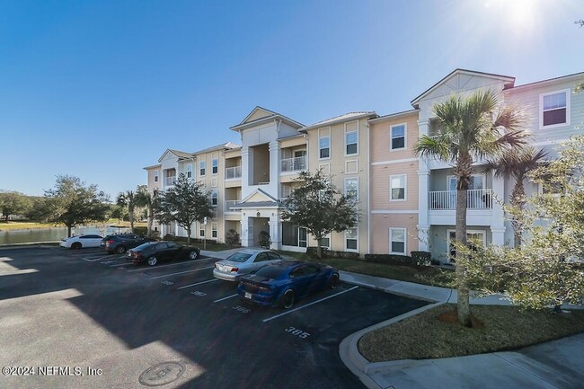 Building Photo - 4917 Key Lime Dr Unit 208
