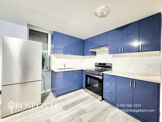 Photo - Spacious 3-Bedroom Basement Apartment with Parking & Shared Backyard in Whitby Unit 2