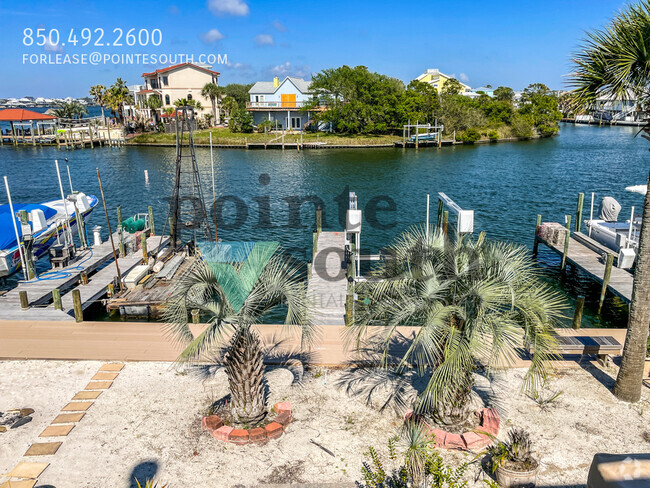 Building Photo - Waterfront 2BD/1.5BA with boat slip AND lift! Unit 4 Rental